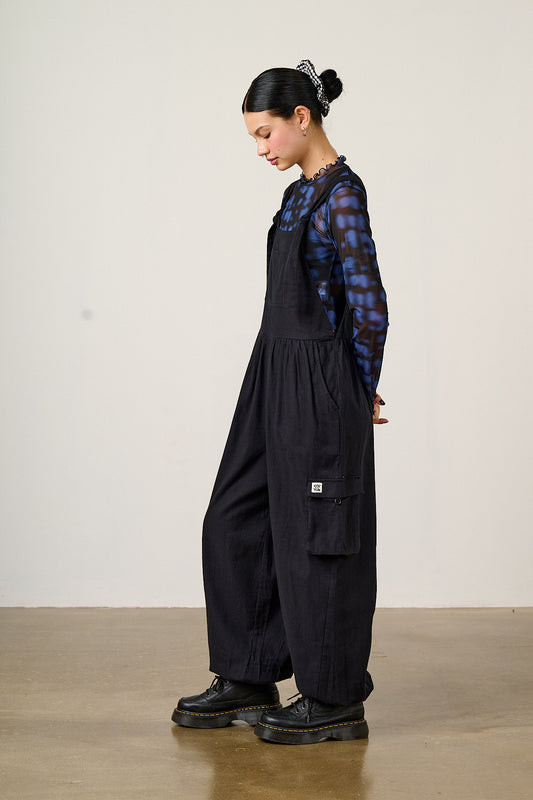 Black Cargo Overalls with Tie-Dye Mesh Top and Platform Boots Black Cargo Overalls with Tie-Dye Mesh Top and Platform Boots