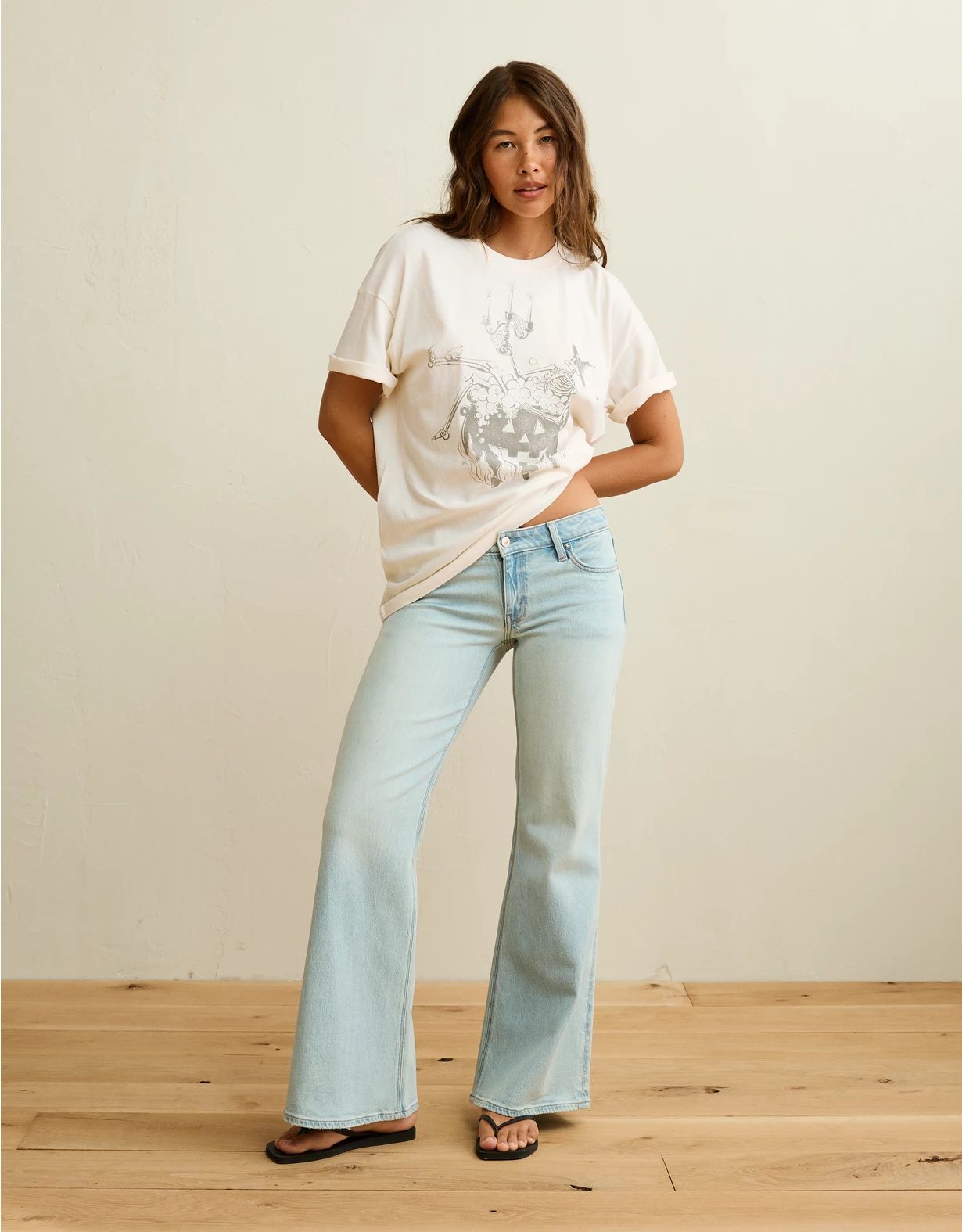 Cream Oversized Graphic T-Shirt with Flared Jeans — Oversized Shirts