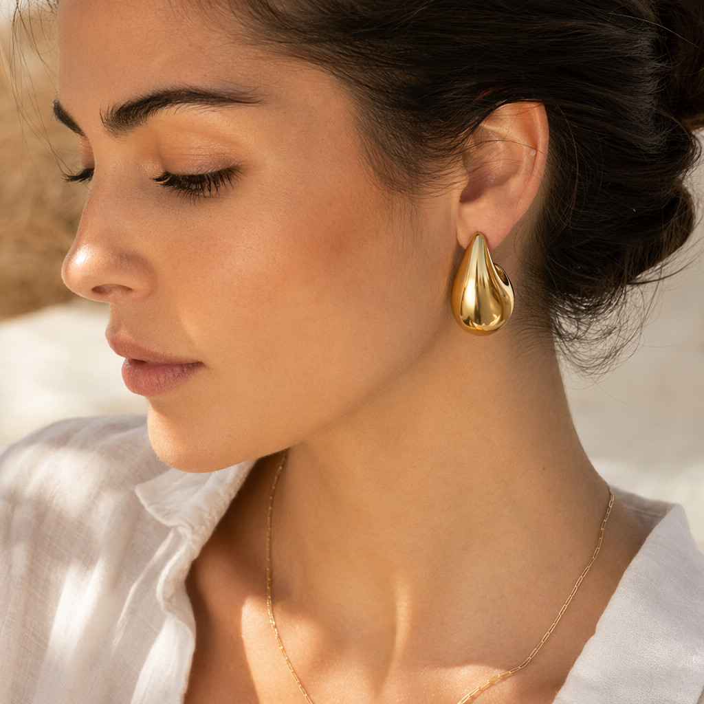 Chunky Gold Teardrop Earrings with a White Button-Up Shirt Chunky Gold Teardrop Earrings with a White Button-Up Shirt — Statement Earrings Outfits