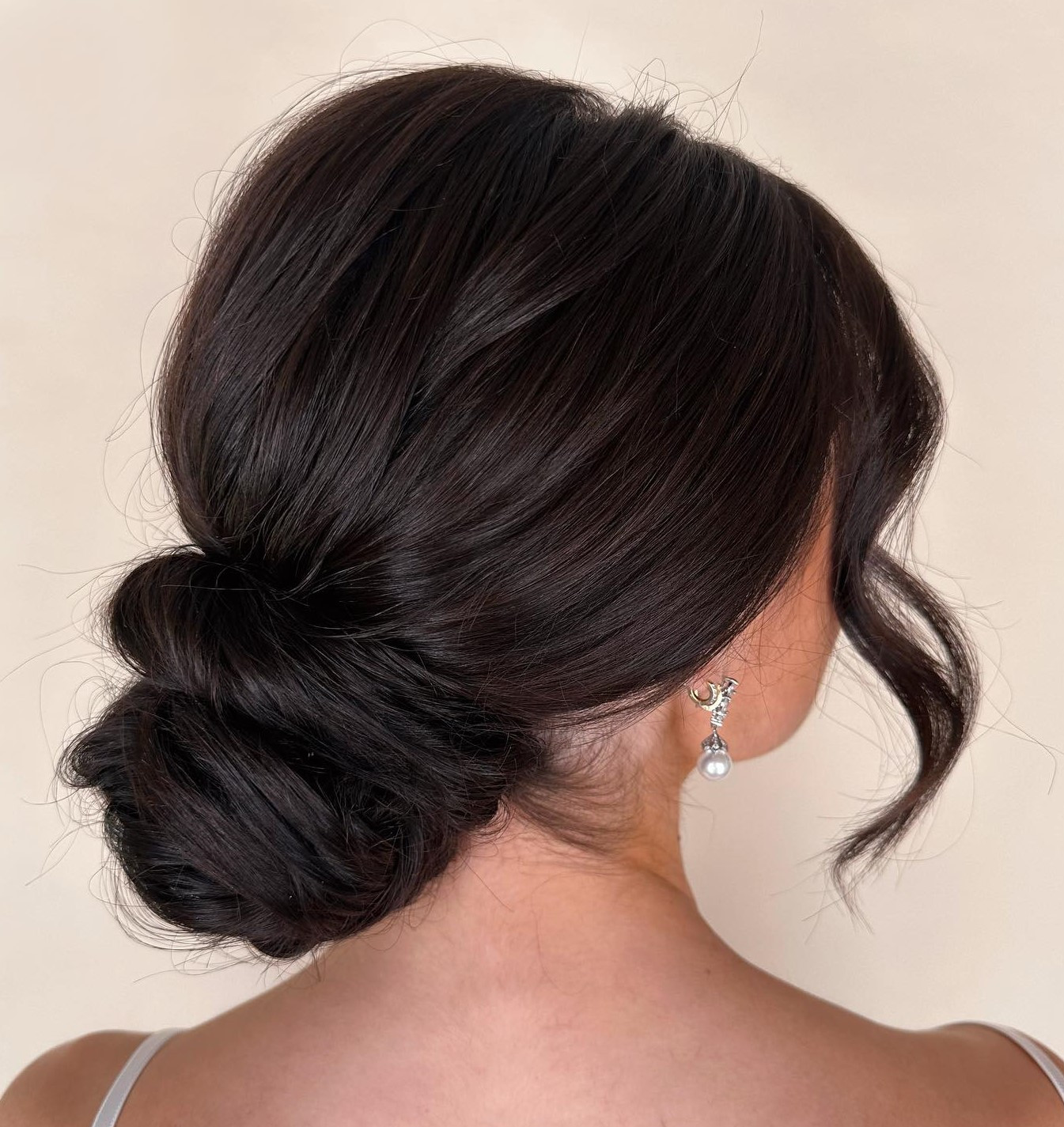 Wavy Dark Brown Textured Low Bun Wavy Dark Brown Textured Low Bun — Low Bun with Curtain Bangs