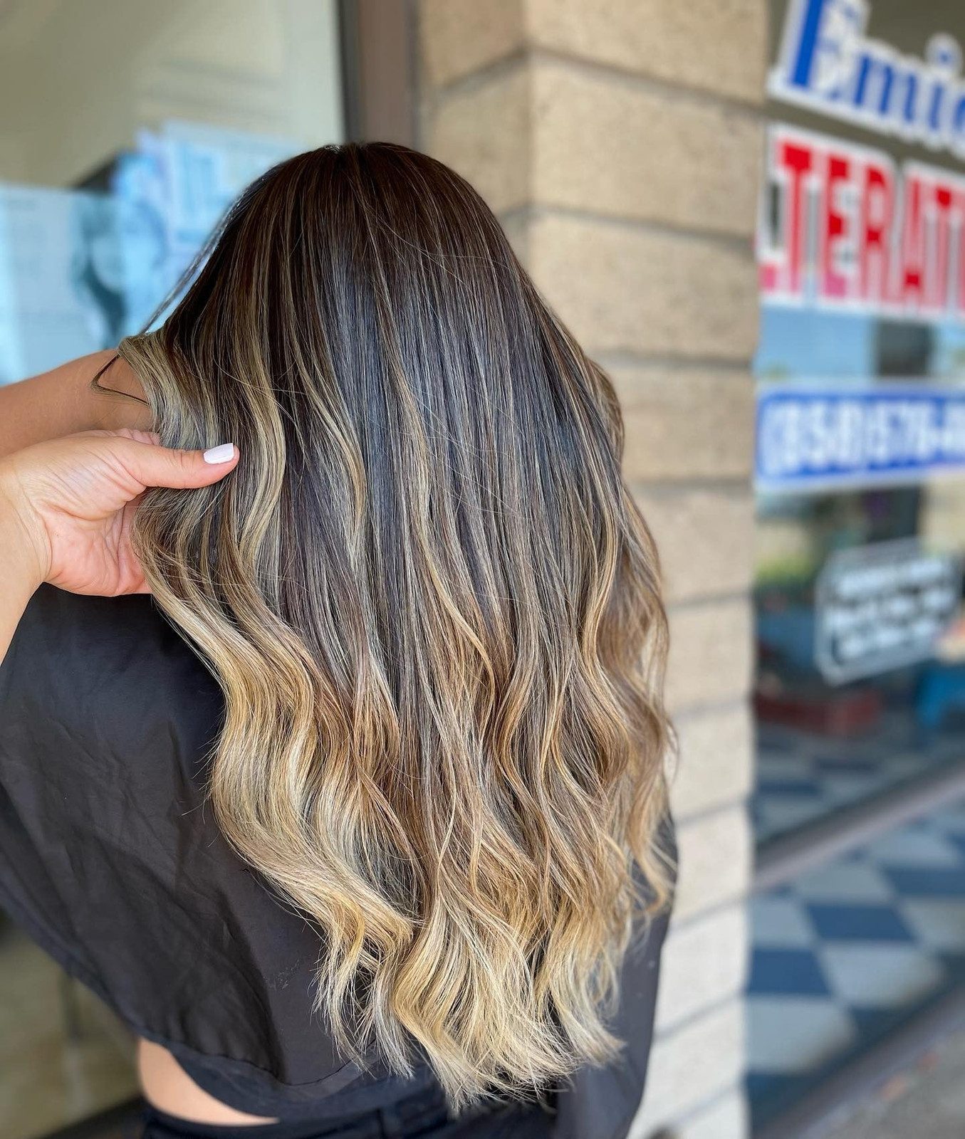 Mid-Back Dark Blonde Base With Lighter Balayage — Blonde Hair Colors
