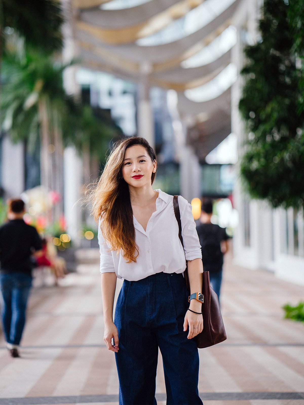 Crisp White Shirt with Dark Wash Denim and Black Pumps — First Day of Work Outfits