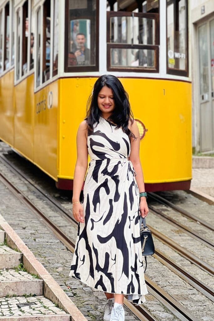 Black and White Abstract Wrap Dress with White Sneakers — Lisbon Outfits