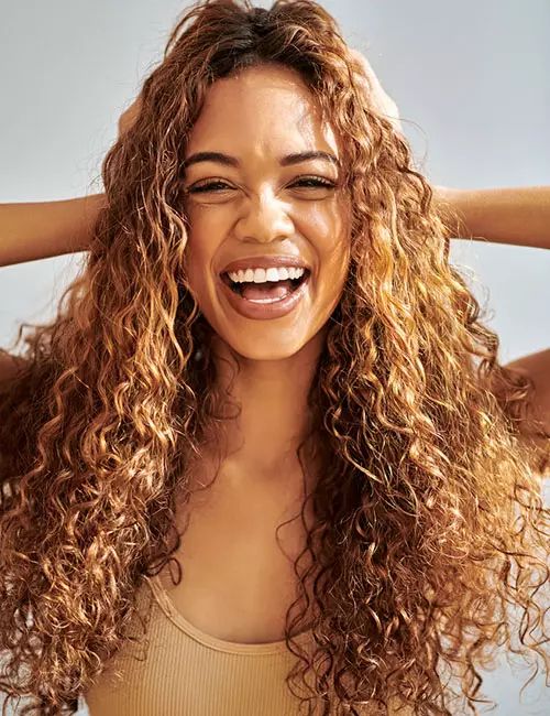 Voluminous Warm Brown Honey Curls — Perm Hairstyles