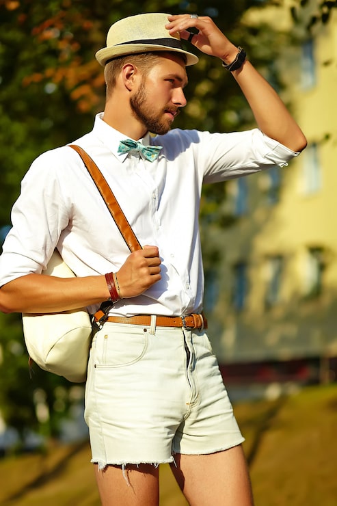 White Shirt and Denim Shorts with Fedora for Casual Exploration White Shirt and Denim Shorts with Fedora for Casual Exploration — Mens Vacation Outfits