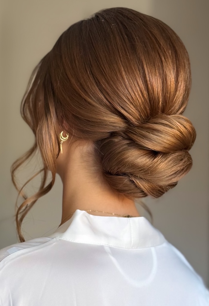 Voluminous Warm Brown Wavy Low Bun