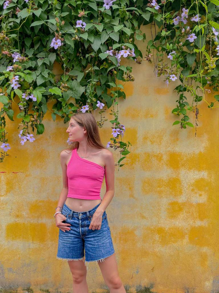 Pink One-Shoulder Crop Top with Denim Shorts for Casual Cool — Mexico Vacation Outfits