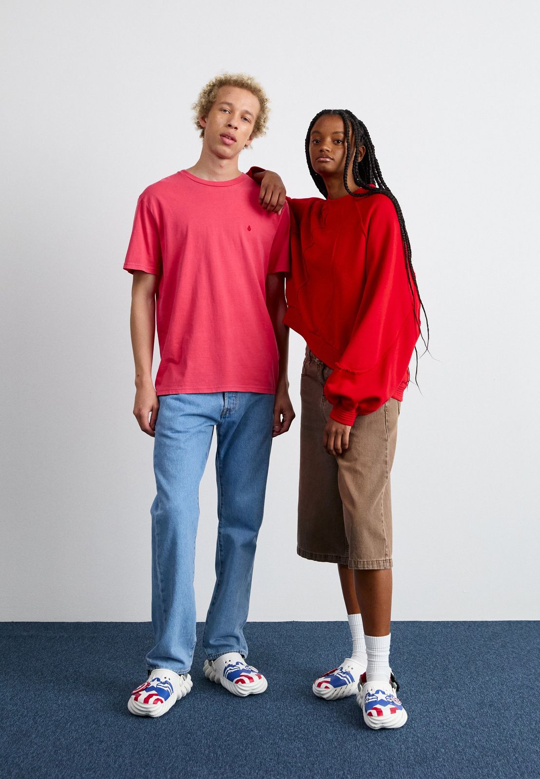 Flag-Patterned Crocs with Red Sweatshirt and Midi Skirt — Crocs Outfits