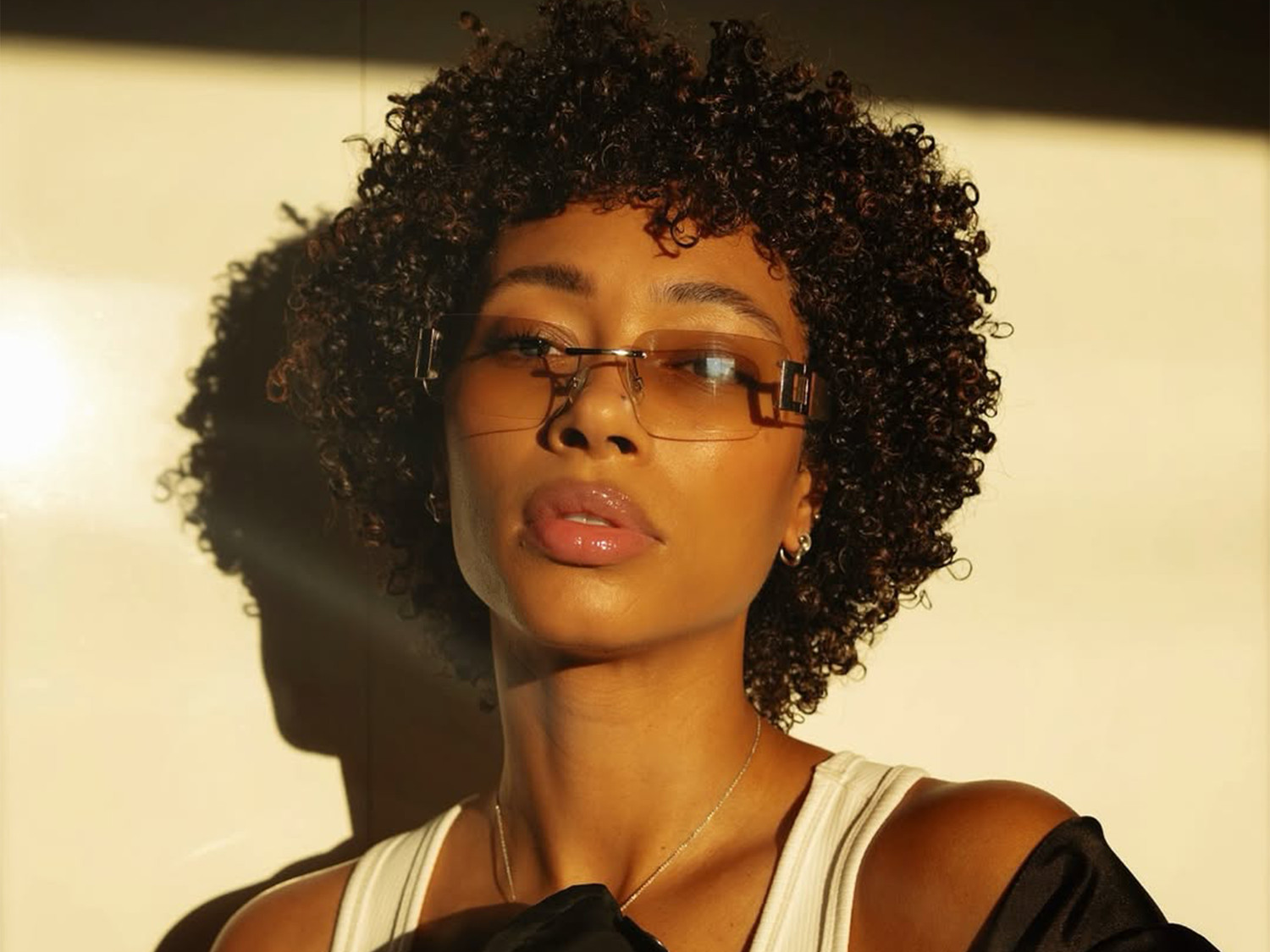 Voluminous Dark Brown Curls — Haircuts with Glasses