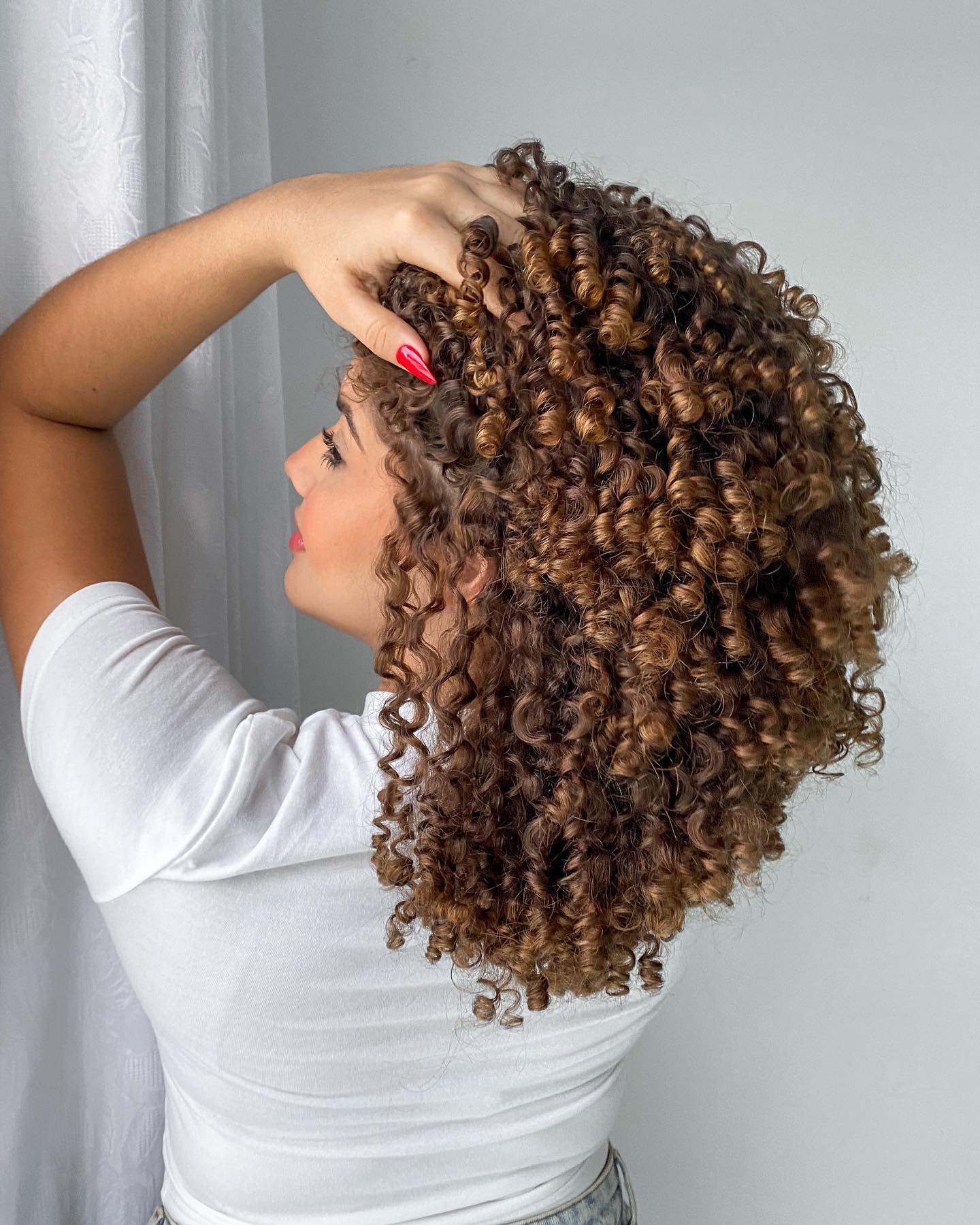 Mid-Back Butterfly With Subtle Highlights — Butterfly Haircut Curly Hair