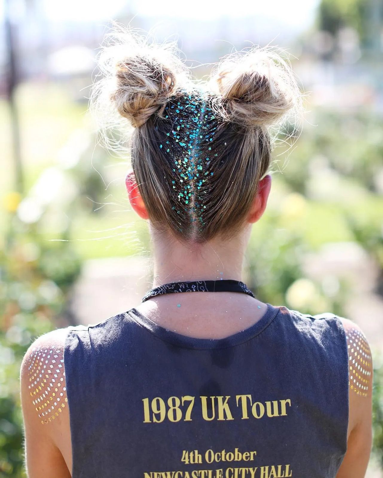 Blonde Space Buns With Blue Glitter Blonde Space Buns With Blue Glitter — Concert Hairstyles