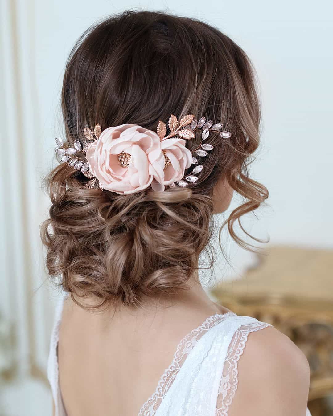 Dark Brown Updo With Floral Accessory Dark Brown Updo With Floral Accessory — Wedding Hairstyles for Thin Hair