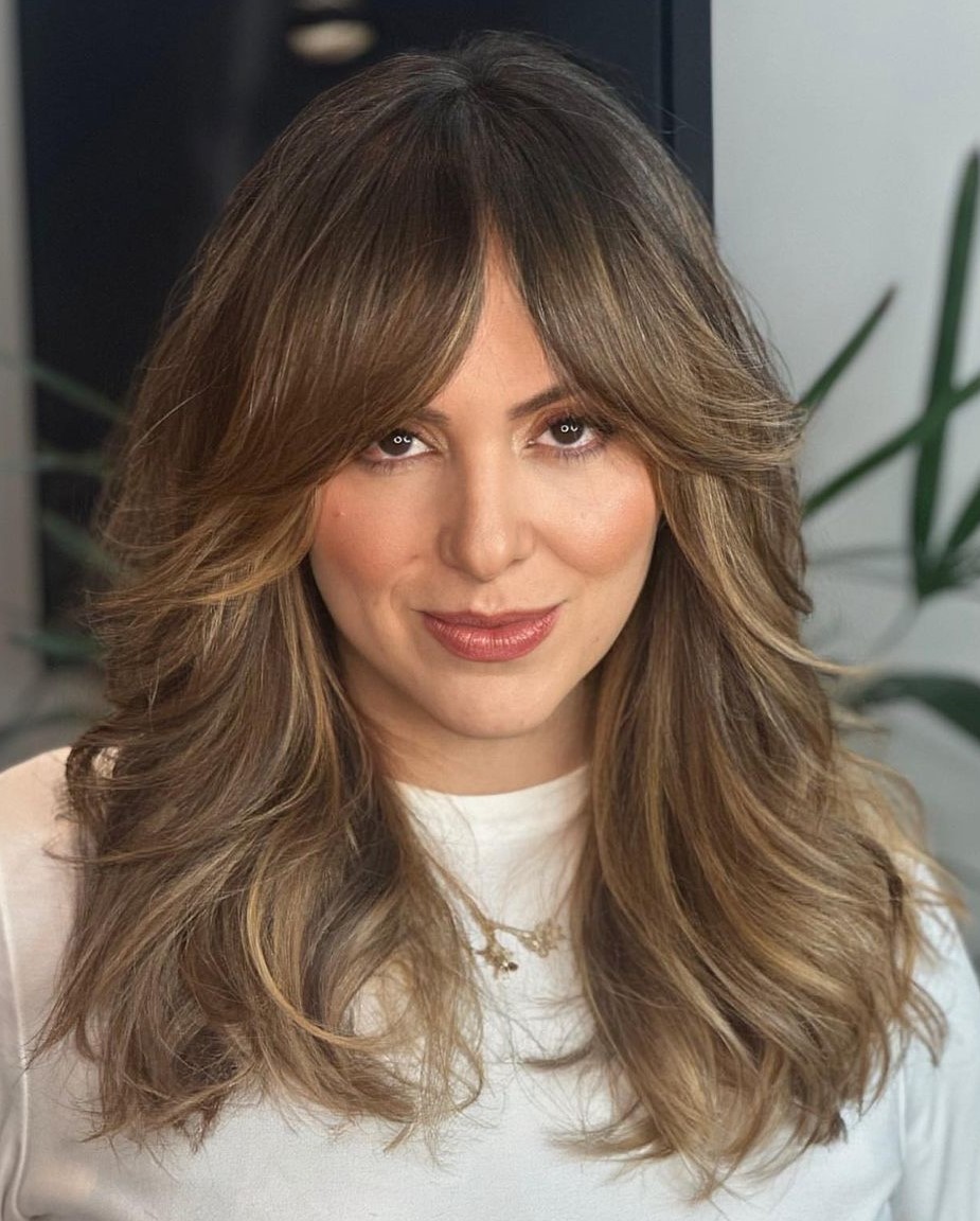 Voluminous Dark Brown Blowout — Long Hair with Bangs