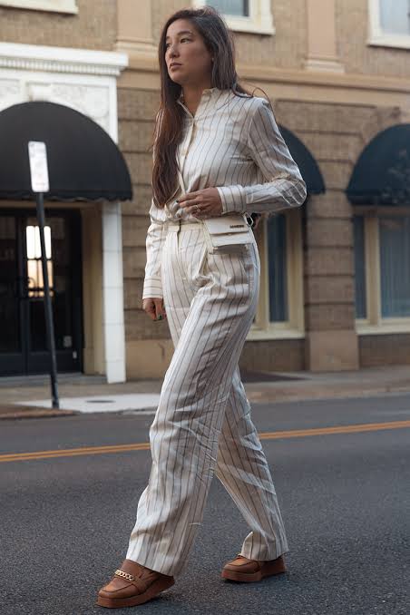 Brown Loafers Elevate a Pinstripe Satin Suit — Loafer Outfits