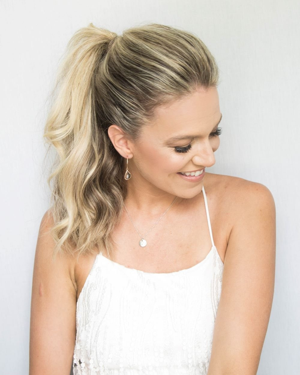Blonde Ponytail With Shoulder Waves Blonde Ponytail With Shoulder Waves — Rehearsal Dinner Hairstyles