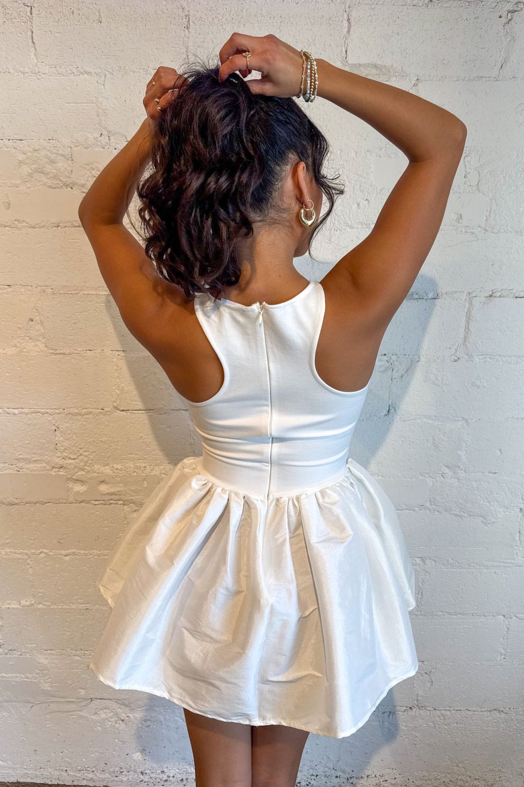 White Satin-Like Mini Dress with Voluminous Skirt White Satin-Like Mini Dress with Voluminous Skirt — Fit and Flare Dresses