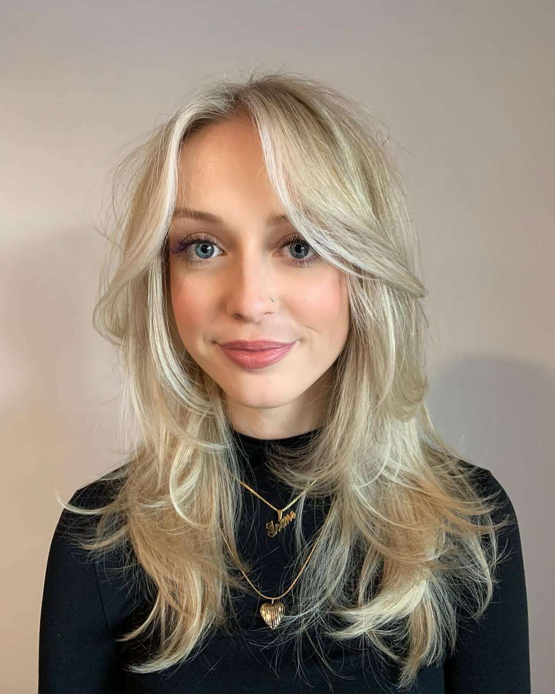 Mid-Back Layers With Side Swept Bangs — Haircuts for Heart Shaped Faces