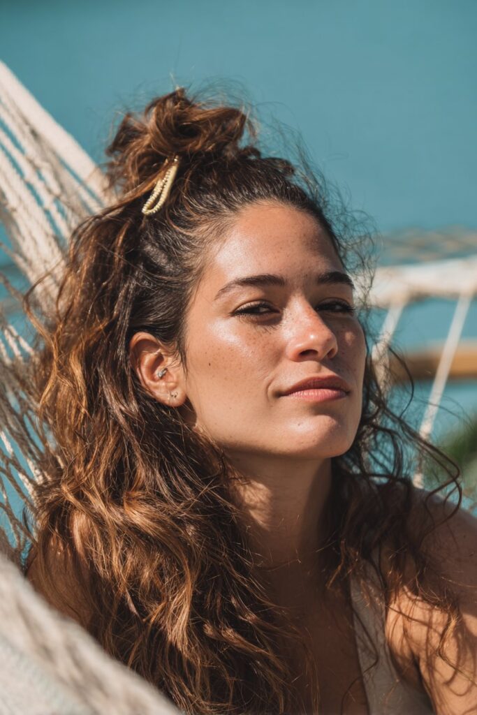 Effortless Messy Bun with Wispy Bangs — Beach Hairstyles
