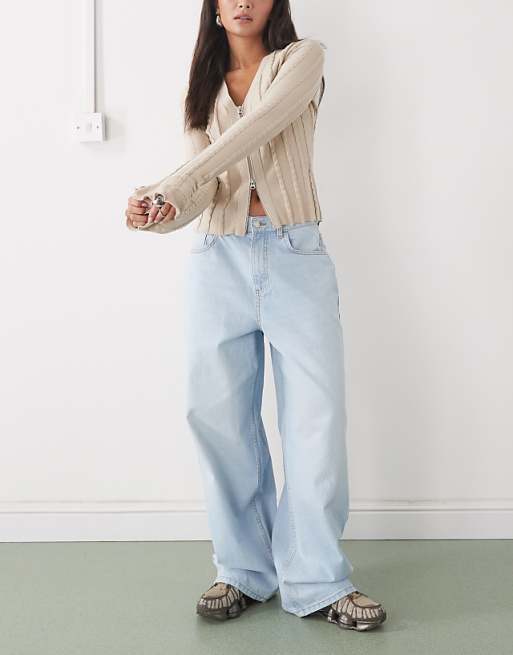 Baggy Wide Leg Jeans with a Zip-Up Cardigan and Chunky Sneakers