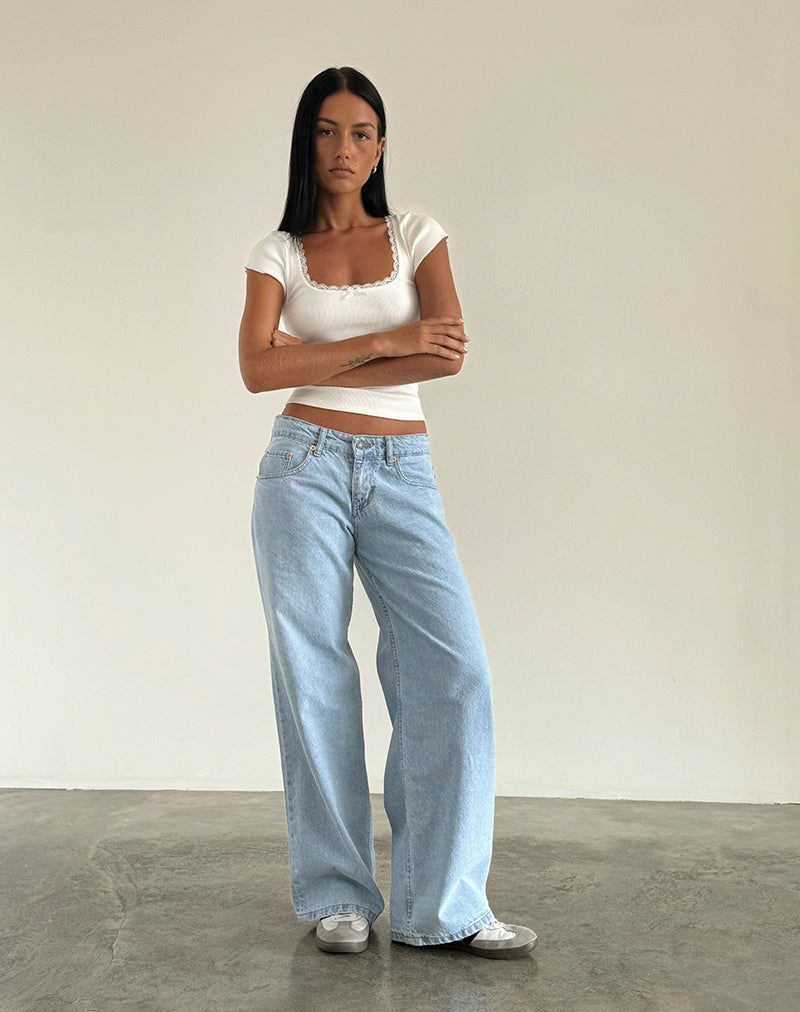 Grey Sneakers Lace-Trimmed Crop Top with Wide-Leg Low-Rise Jeans Grey Sneakers Lace-Trimmed Crop Top with Wide-Leg Low-Rise Jeans — Low Rise Jeans