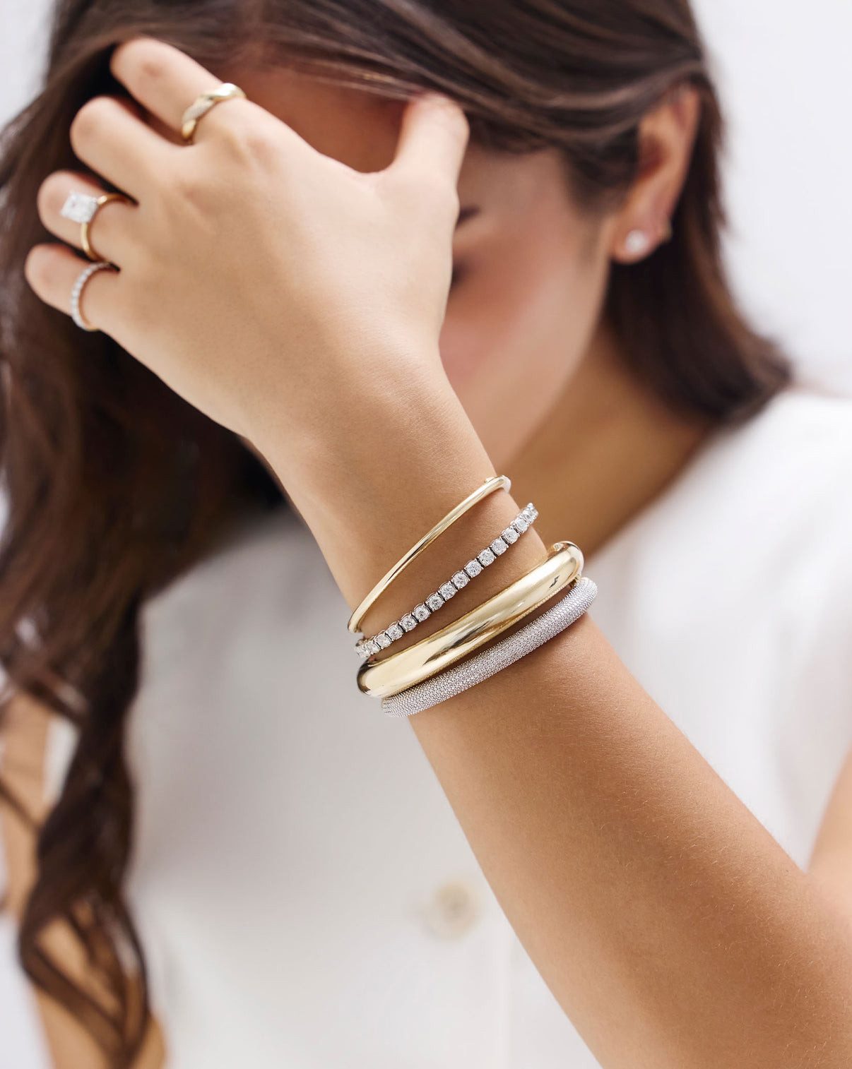 Layered Wrist: Diamond Tennis Bracelet and Gold Bangle Layered Wrist: Diamond Tennis Bracelet and Gold Bangle — Tennis Bracelets