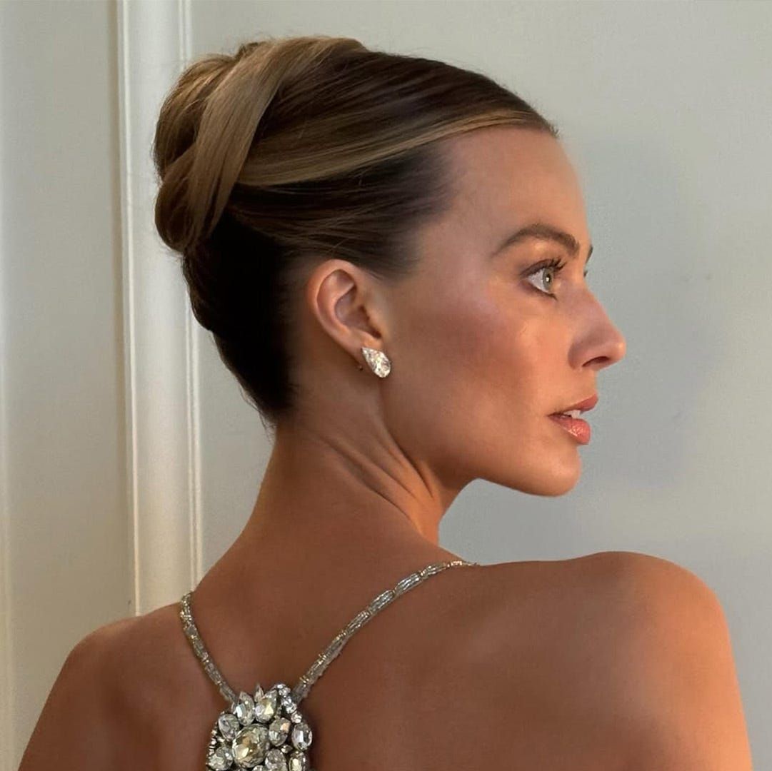 Sleek Polished Low Chignon for Thick Hair Sleek Polished Low Chignon for Thick Hair — Wedding Guest Hairstyles