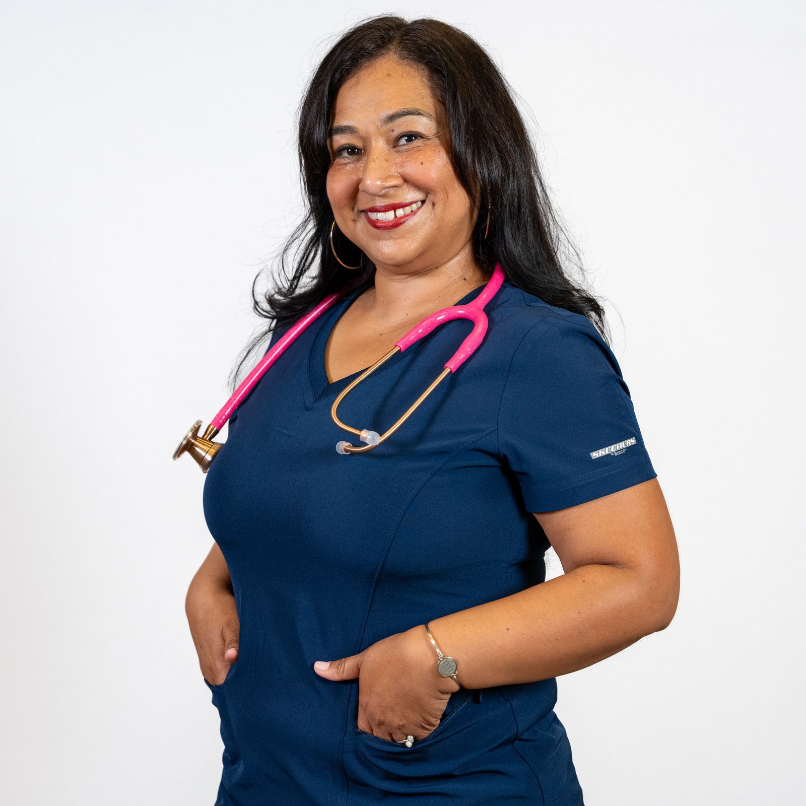 Fitted Navy Scrub Top with Stethoscope and Bracelet Fitted Navy Scrub Top with Stethoscope and Bracelet — Nurse Outfits