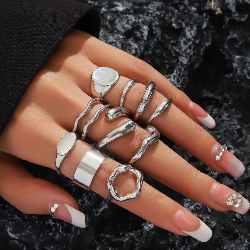 Artistic Silver Stacking Rings with Blazer Artistic Silver Stacking Rings with Blazer — Silver Jewelry Stack