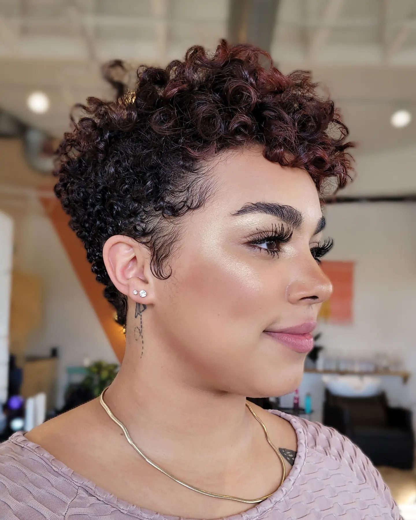 Pixie With Subtle Burgundy Highlights Pixie With Subtle Burgundy Highlights — Short Curly Hairstyles