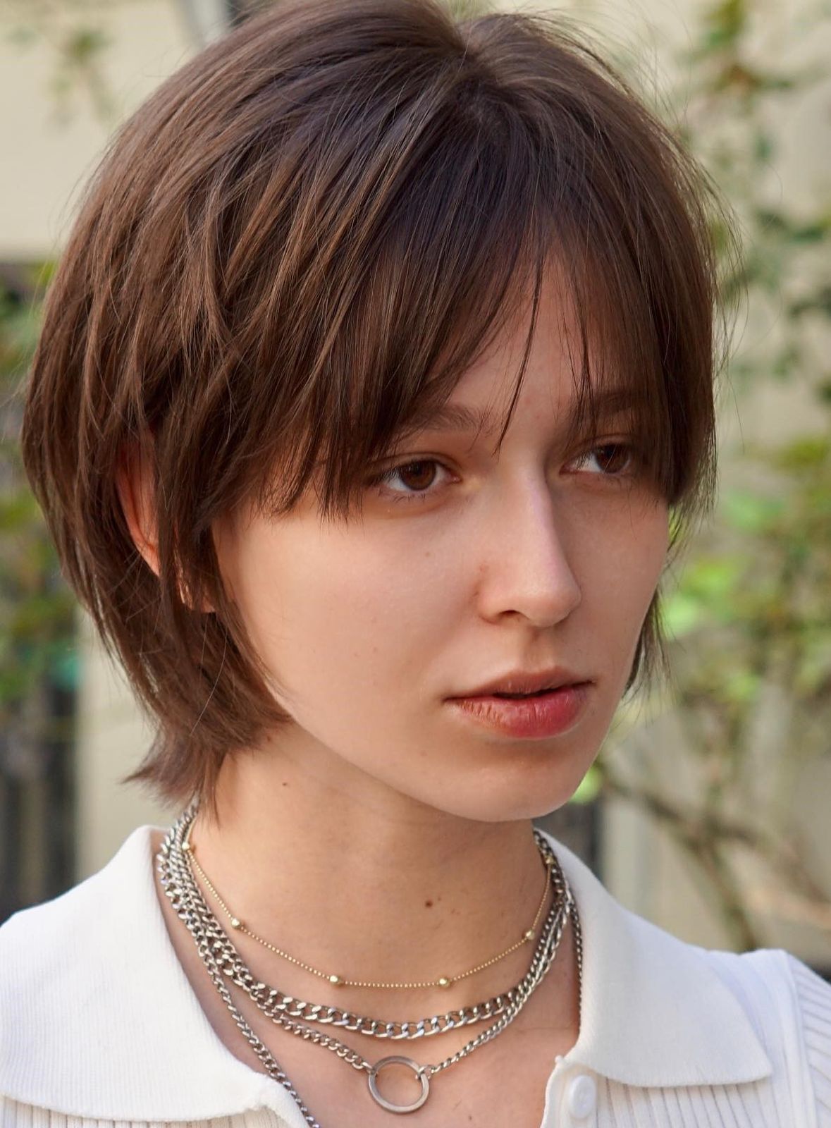 Sleek Medium Brown Bixie With Blunt Bangs Sleek Medium Brown Bixie With Blunt Bangs — Bixie Haircut