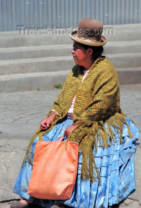 Traditional Charm: Blue Skirt, Green Shawl, and Bowler Hat Traditional Charm: Blue Skirt, Green Shawl, and Bowler Hat — Chola Outfits