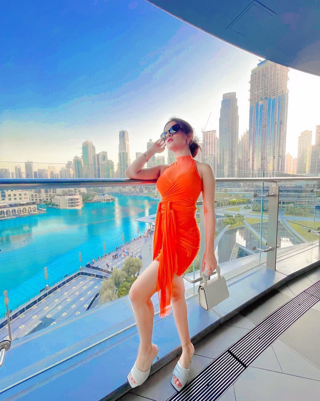 Resort Occasion: Vibrant Orange Halter Dress Resort Occasion: Vibrant Orange Halter Dress — Dubai Outfits
