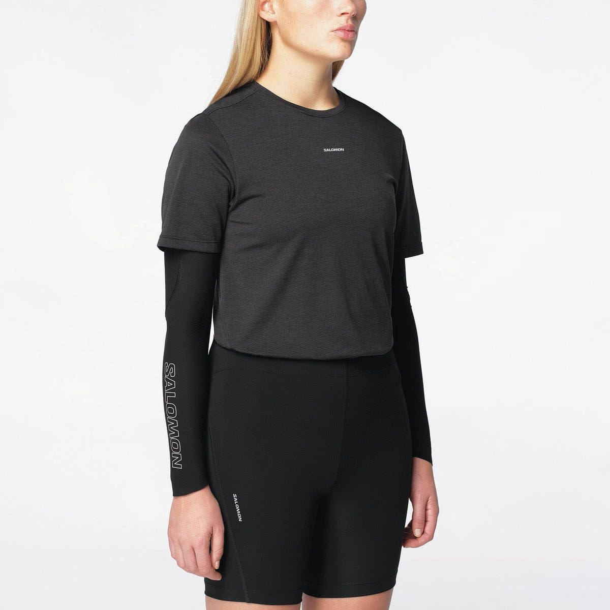 Sportswear Focus: Dark Grey T-Shirt and Black Shorts with Salomon Branding Sportswear Focus: Dark Grey T-Shirt and Black Shorts with Salomon Branding — Salomon Outfits
