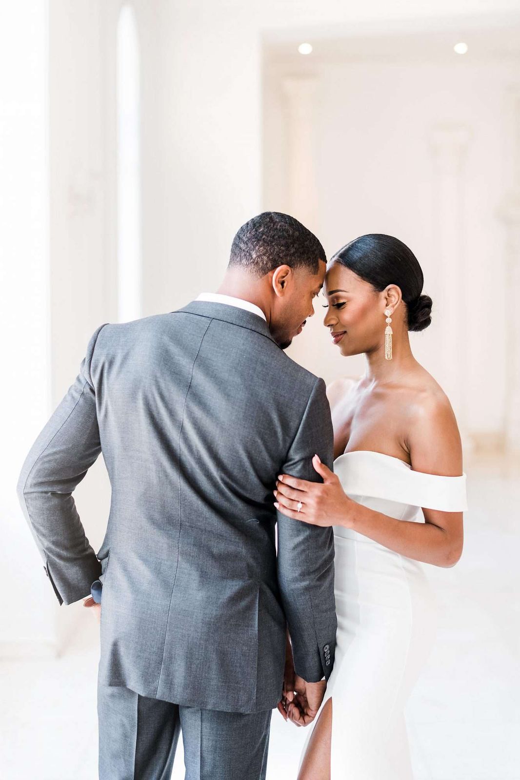 Low Bun With Decorative Hairpiece Visual Idea Low Bun With Decorative Hairpiece Visual Idea — Sleek Bun Wedding Hair