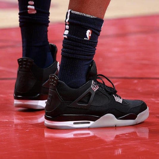 Athletic Edge: Black and White Jordan 4s with Navy Socks Athletic Edge: Black and White Jordan 4s with Navy Socks — Jordan 4 Outfits