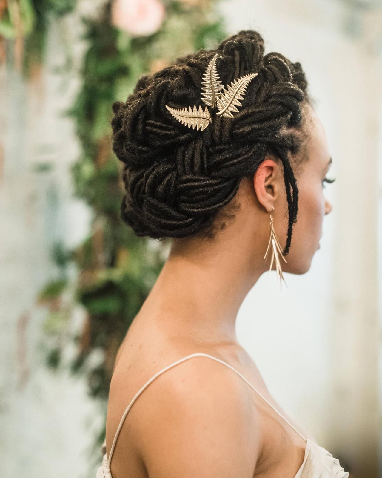 Braided Updo With Nature-Inspired Accessory — Natural Hair Wedding Styles
