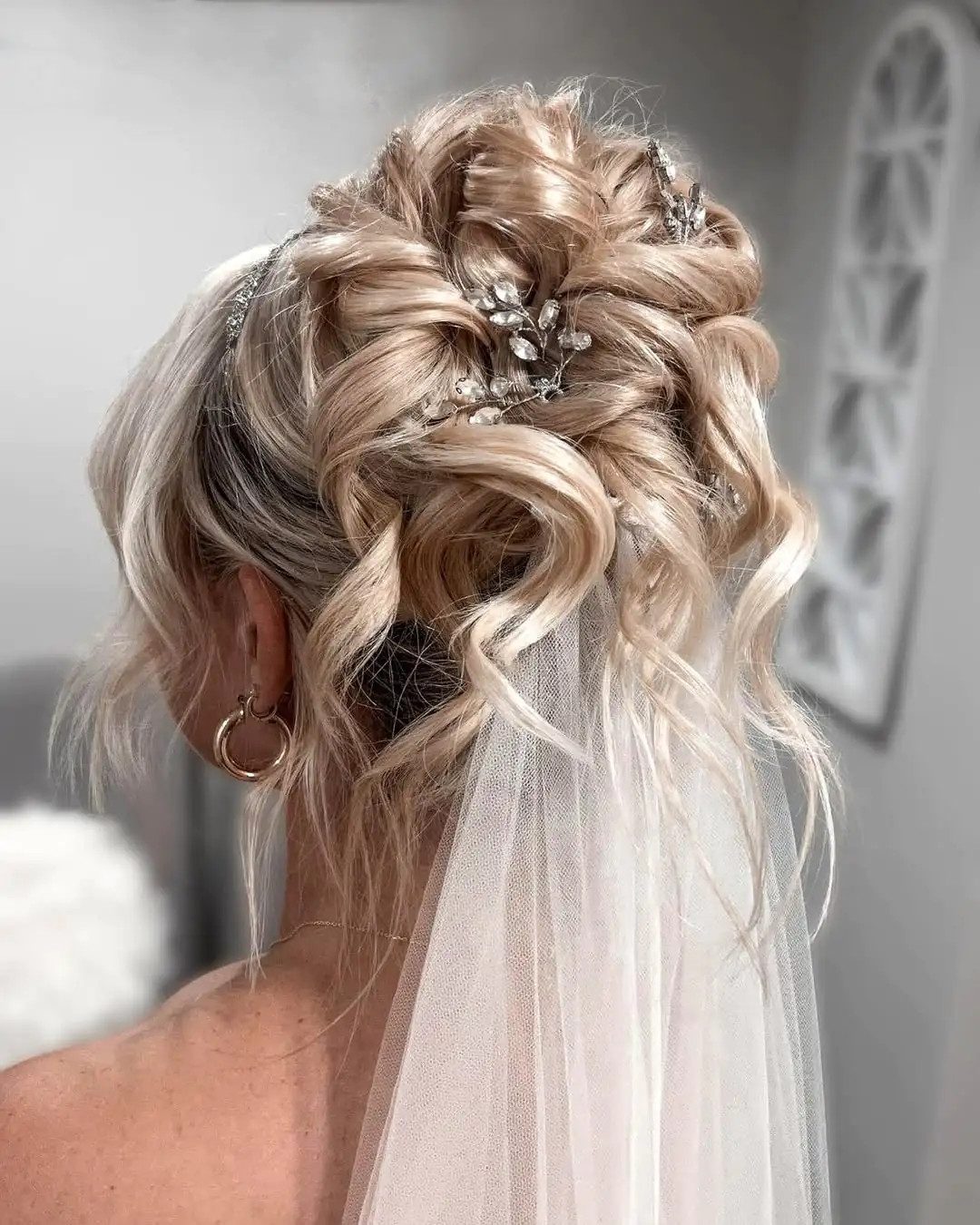 Voluminous Updo with Defined Curls Voluminous Updo with Defined Curls — Wedding Hairstyles with Veil