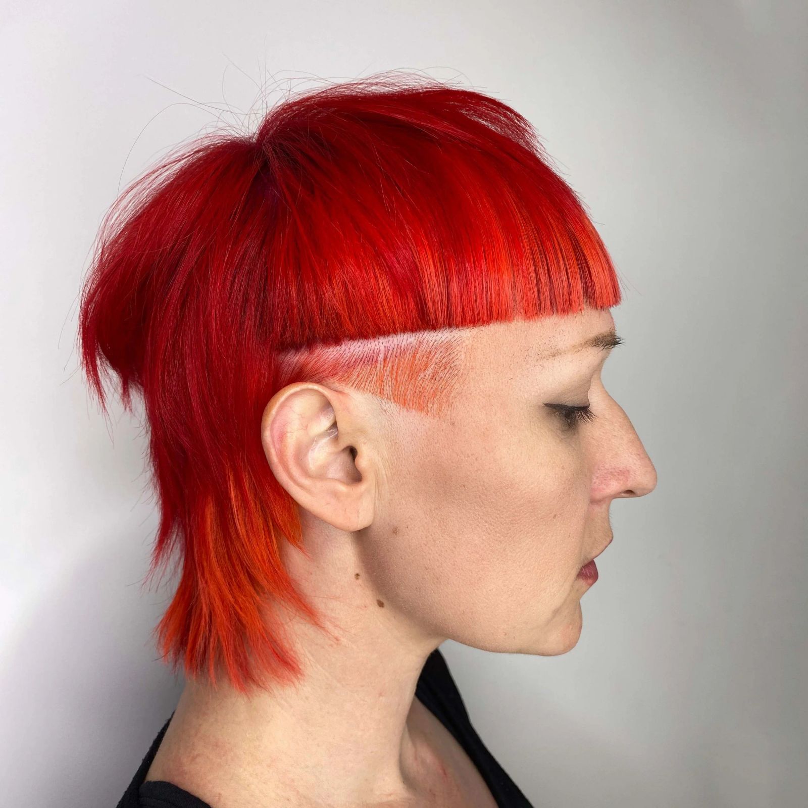 Vibrant Red Mullet with Shaved Sides — Mullet Haircuts for Women