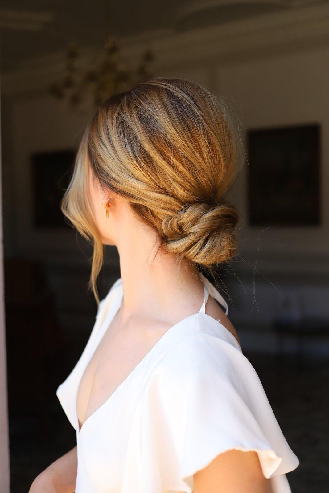 Loose Honey Blonde Bun with Face-Framing Pieces — Wedding Low Bun