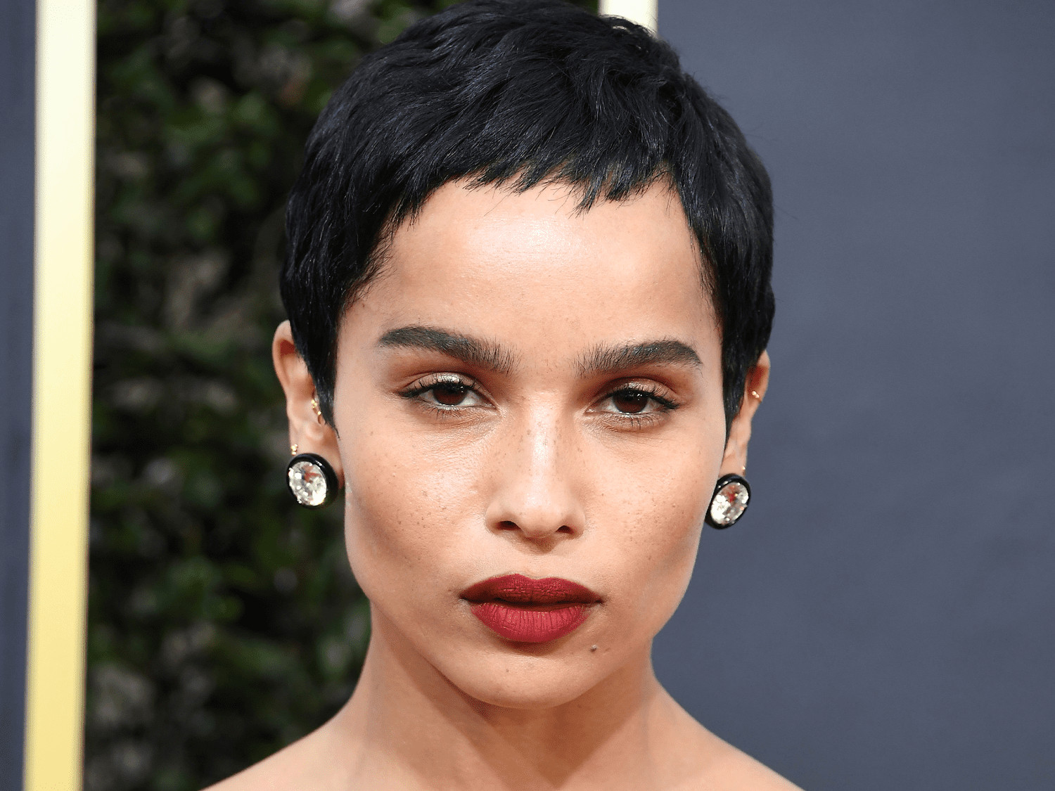 Sleek Black Pixie With Wispy Bangs — Hairstyles for Growing Out a Pixie