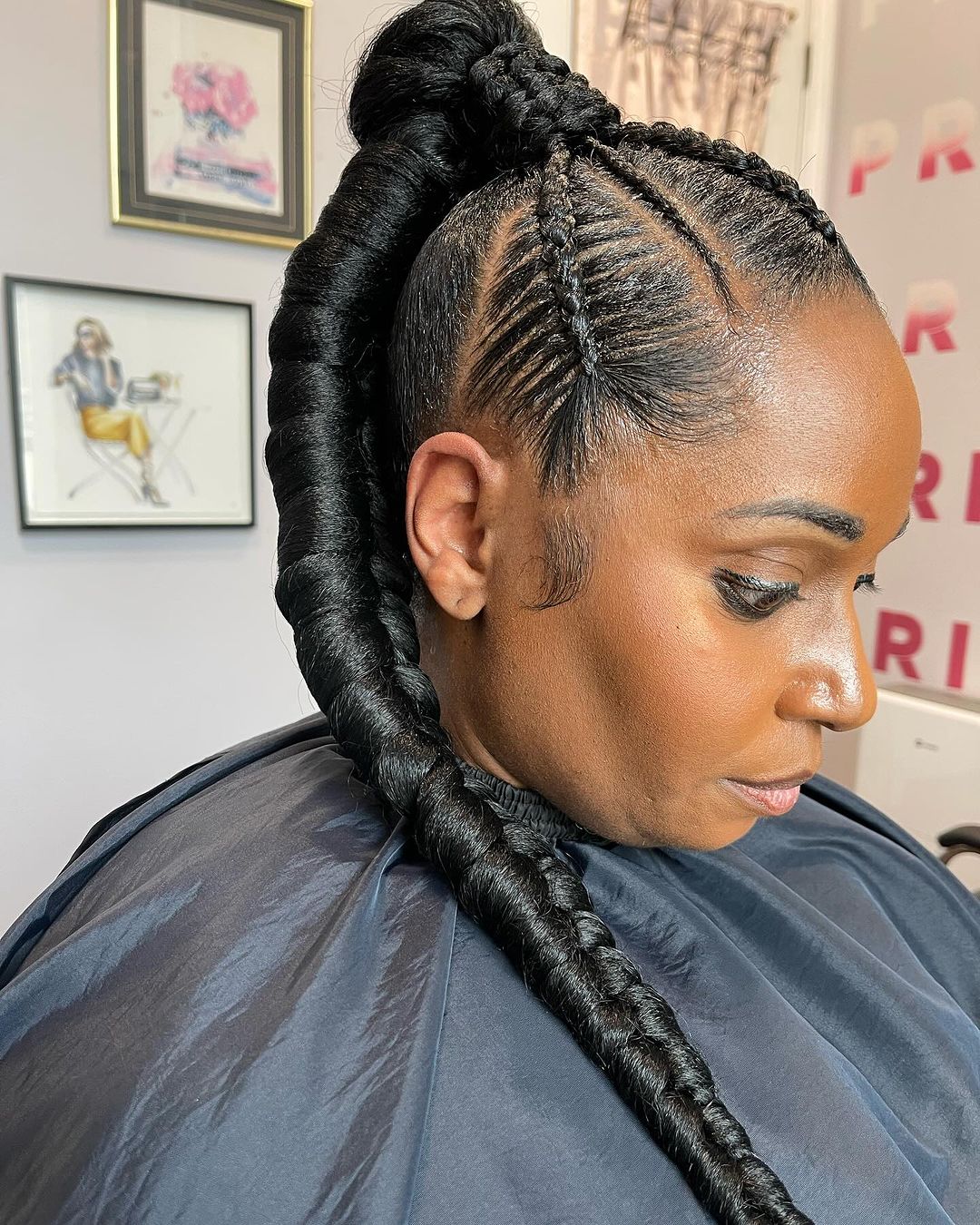 Mid-Back Cornrows Into A Large Braided Ponytail