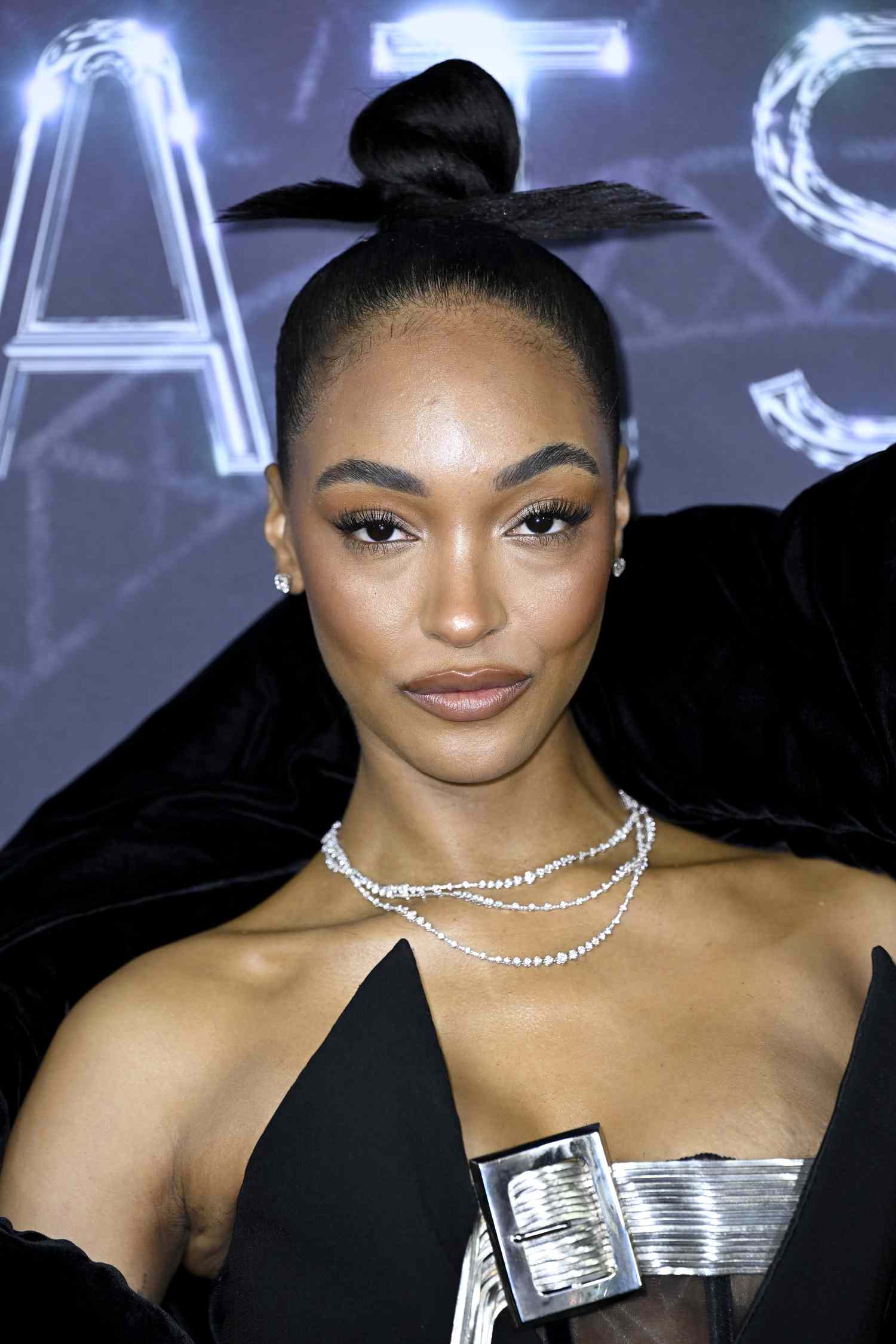 Sleek Black High Bun — Party Hairstyles