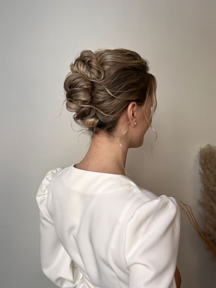 Textured Blonde Wavy Chignon Textured Blonde Wavy Chignon