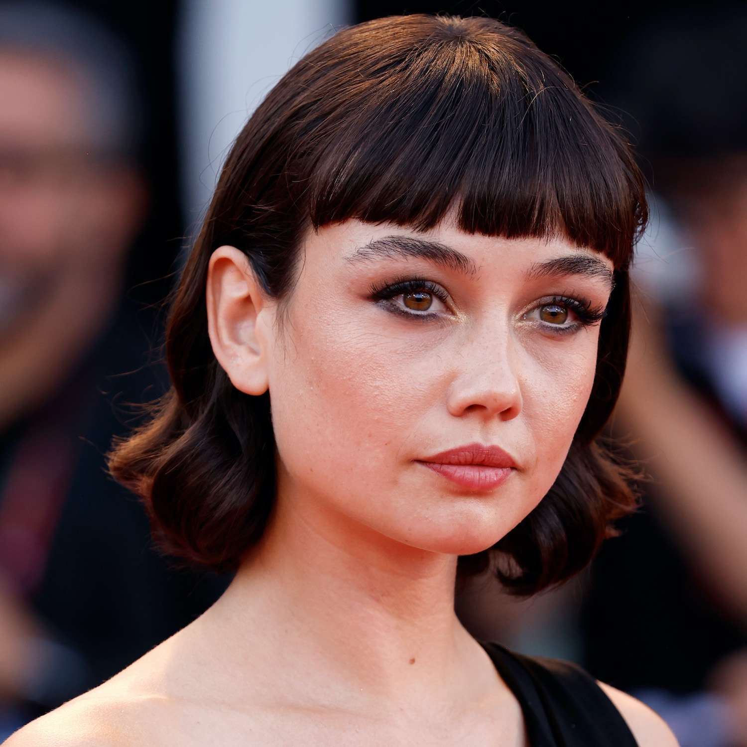 Wavy Bob with Wispy Baby Bangs and Dark Dress Wavy Bob with Wispy Baby Bangs and Dark Dress