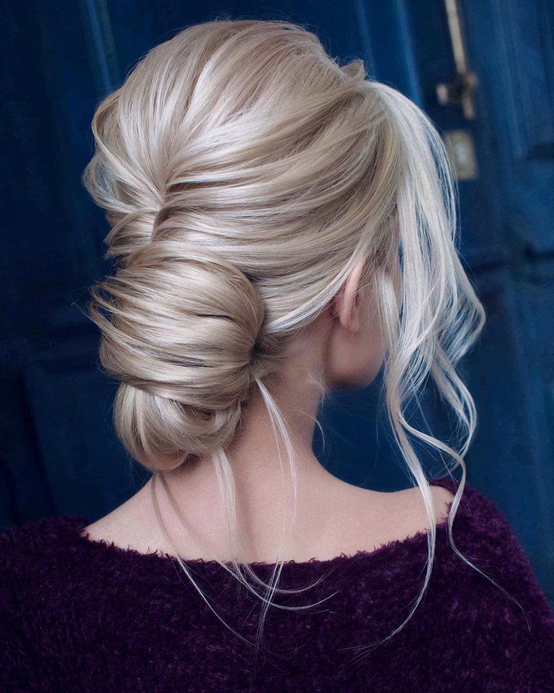 Voluminous Low Bun With Twisted Details Voluminous Low Bun With Twisted Details — Homecoming Hairstyles