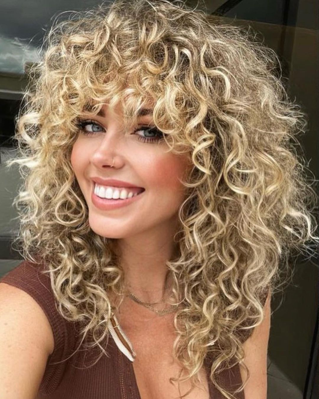30 Wolf Cut Curly Hair Ideas to Let Your Curls Stand Out - Hair Adviser
