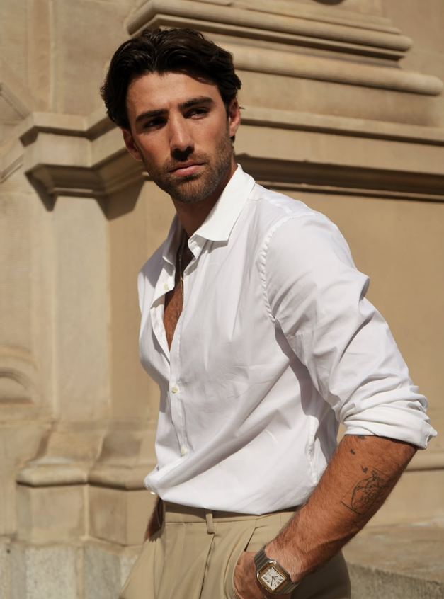 Relaxed White Shirt with Open Collar and Beige Trousers Relaxed White Shirt with Open Collar and Beige Trousers — Mens Business Casual Outfits