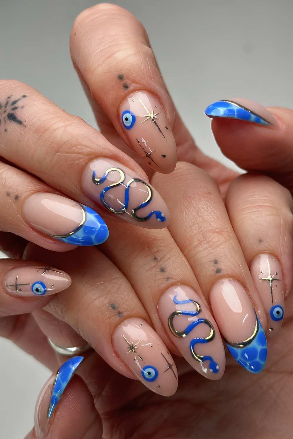 Gold Snake and Evil Eye Nails Gold Snake and Evil Eye Nails