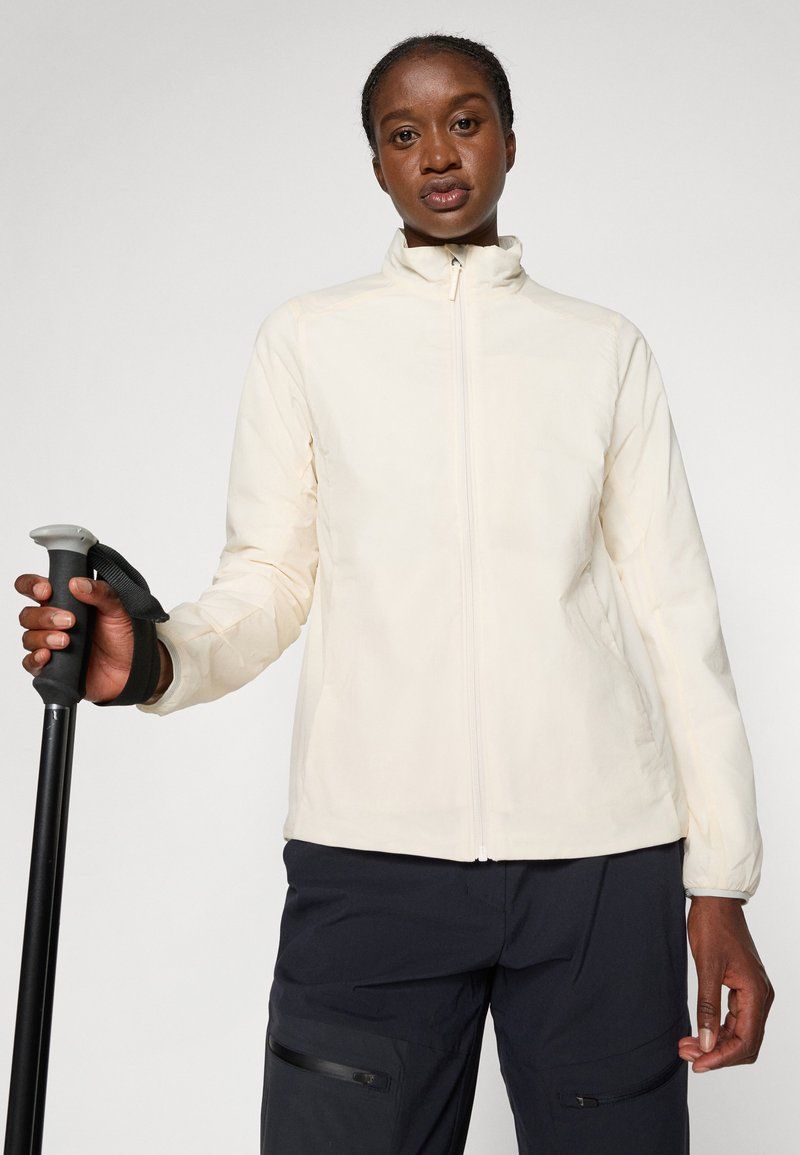 Clean Lines: Off-White Jacket and Navy Trousers with Salomon Footwear Clean Lines: Off-White Jacket and Navy Trousers with Salomon Footwear — Salomon Outfits