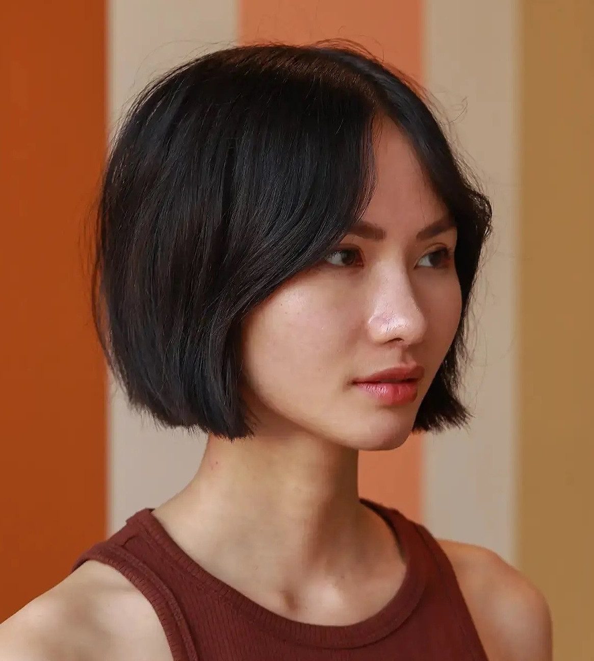 Dark Brown With Subtle Highlights Textured Collarbone Bob with Side Bangs Dark Brown With Subtle Highlights Textured Collarbone Bob with Side Bangs — Haircuts for Diamond Faces
